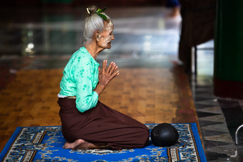 Praying at the Shwedagon