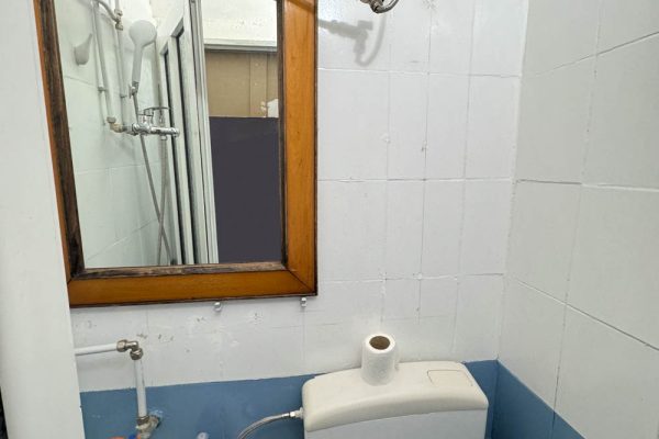 The low hanging tube in this bathroom in a hostel in Vlorë had a 220 volt short circuit going through.